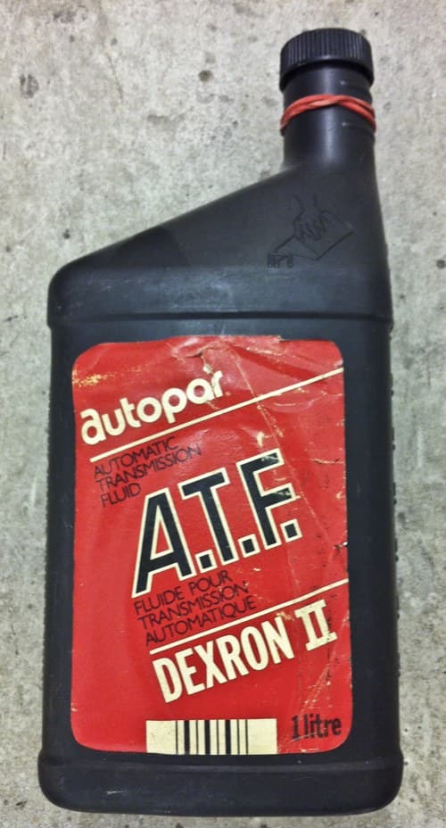 Sealed litre bottle of fully synthetic engine oil