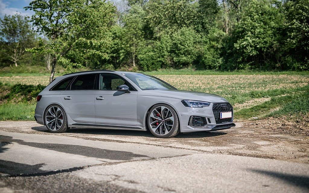Estate lowered on coilovers, sitting level over the arches