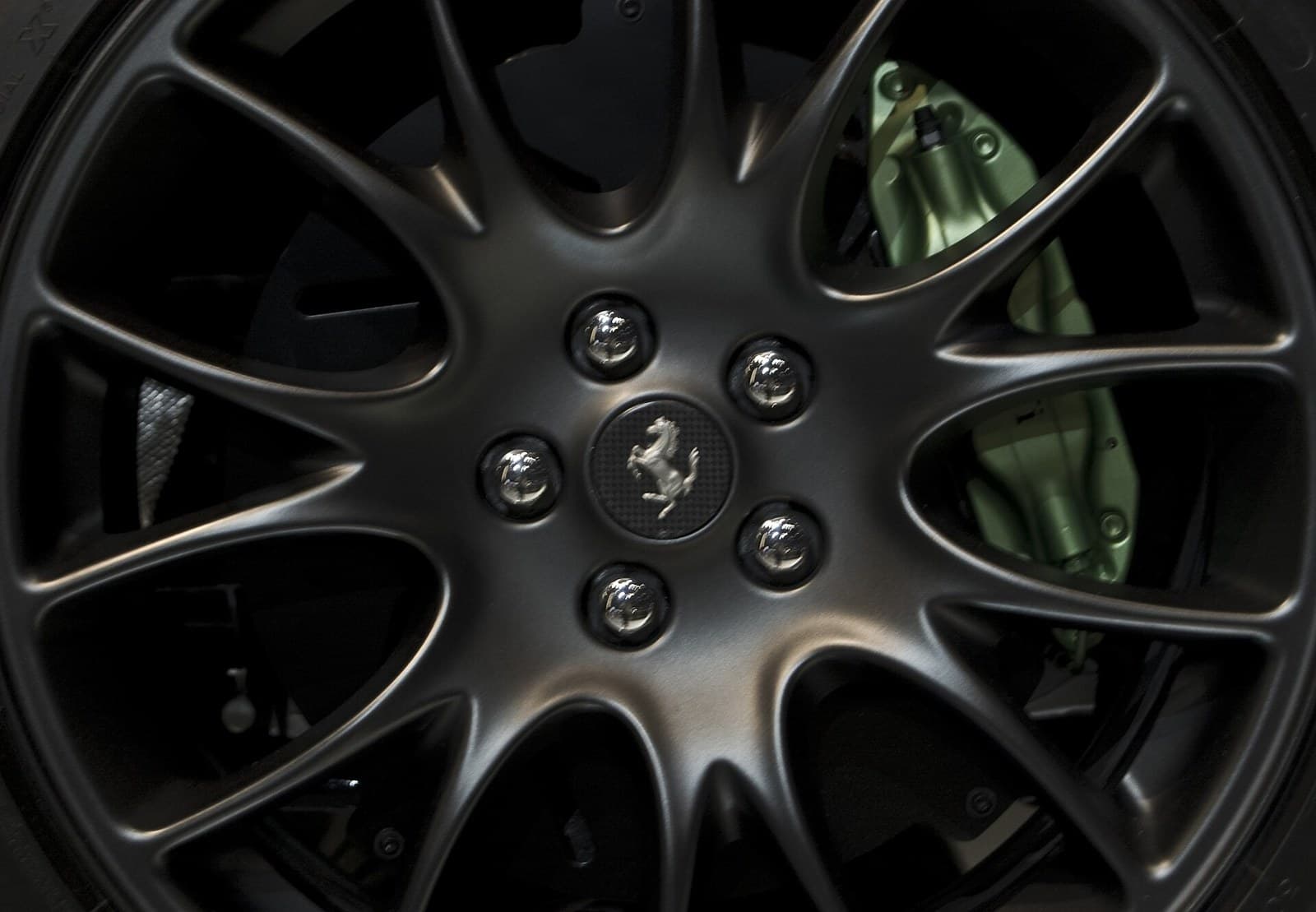 Satin black forged wheel fitted to a supercar