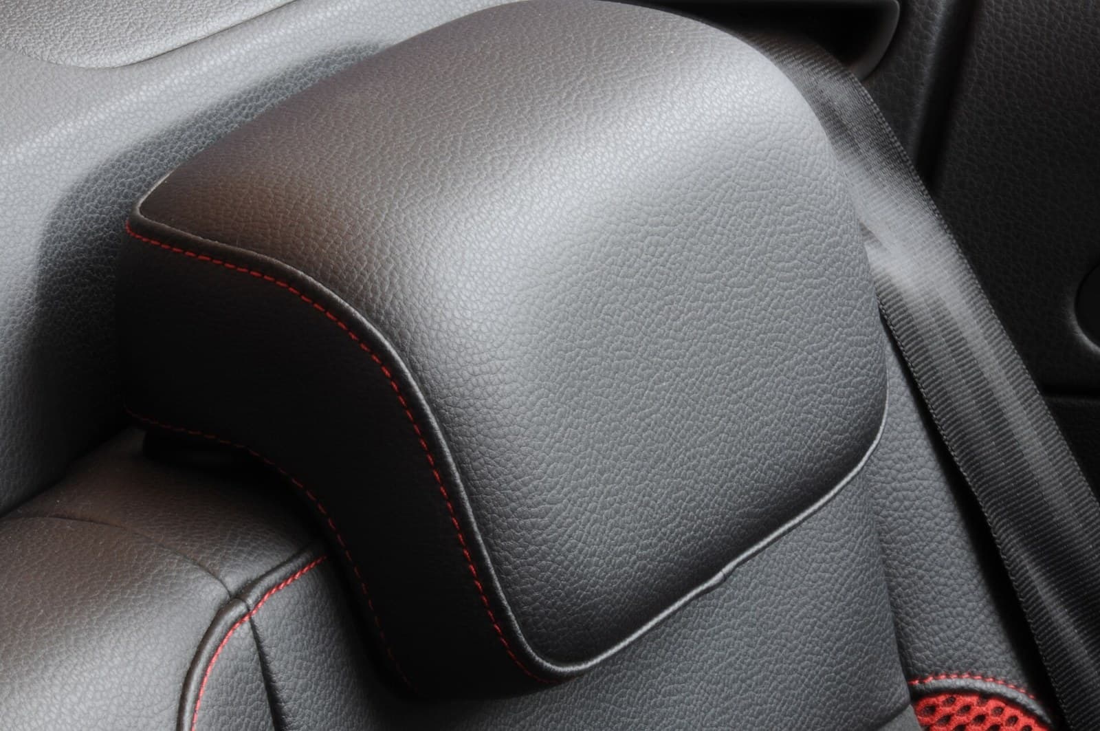 Black leather shoulder bolster and headrest