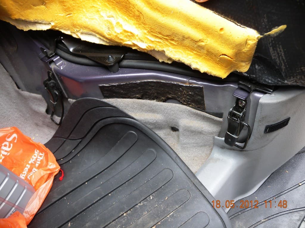 Front liner seated against the transmission tunnel