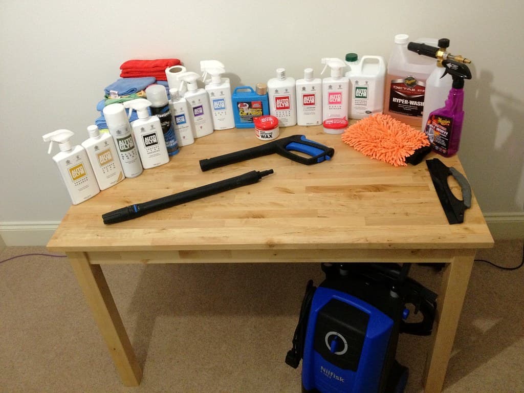 The full kit laid out: wash, compound, polish and wax